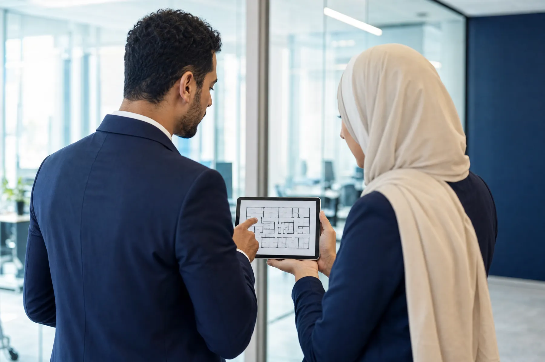 Reviewing a floor plan with a client